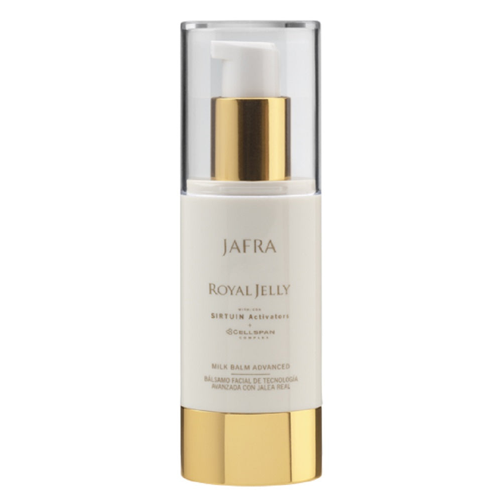 Skincare bottle with gold cap and white body on a white background