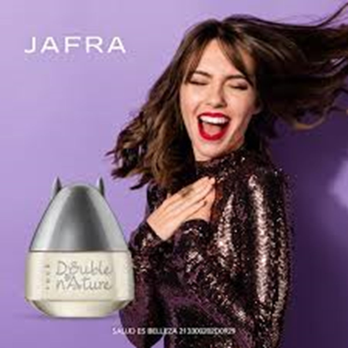 Woman with a sparkling outfit and a JAFRA product on a purple background