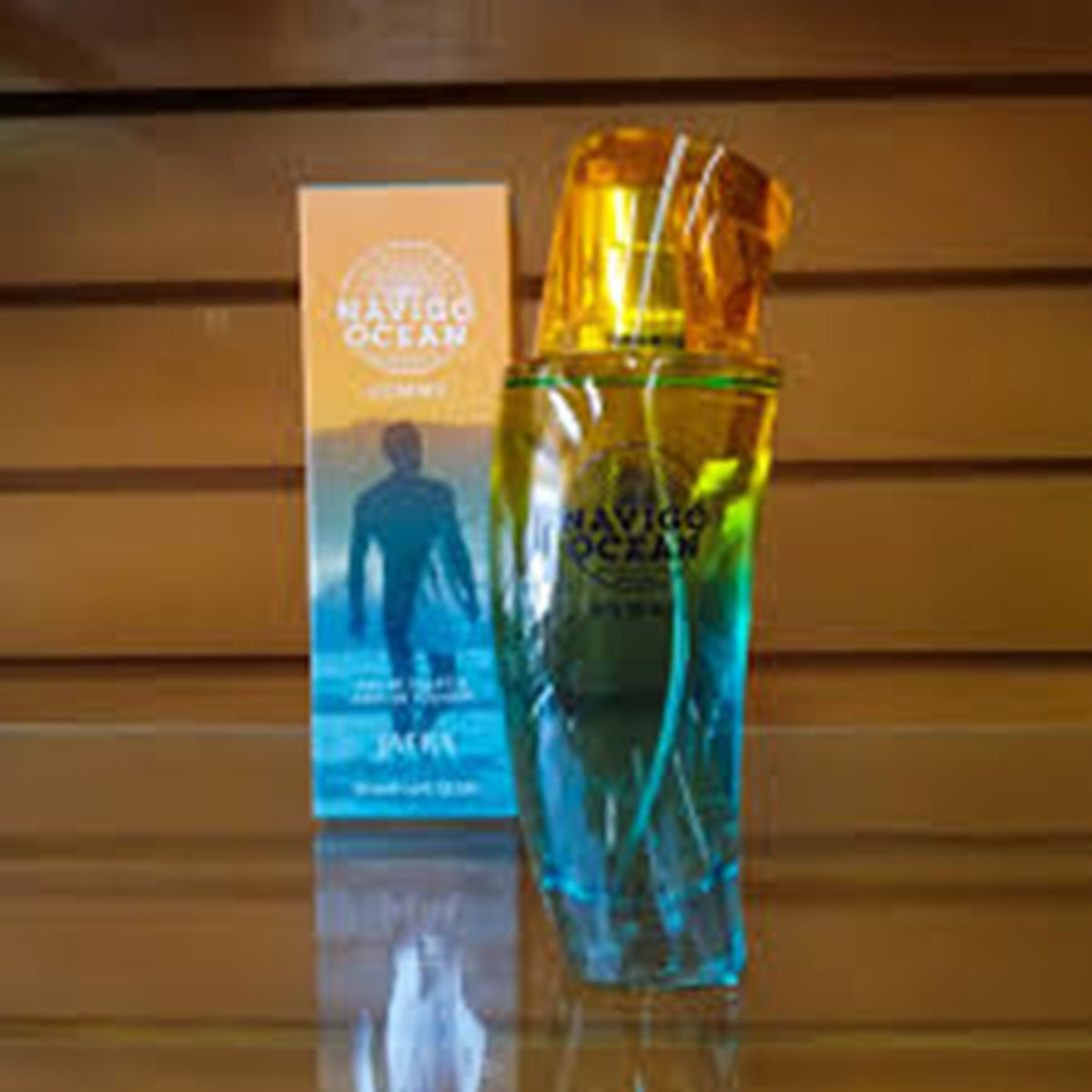 Bottle and packaging of 'MAGIC OCEAN' on a wooden surface