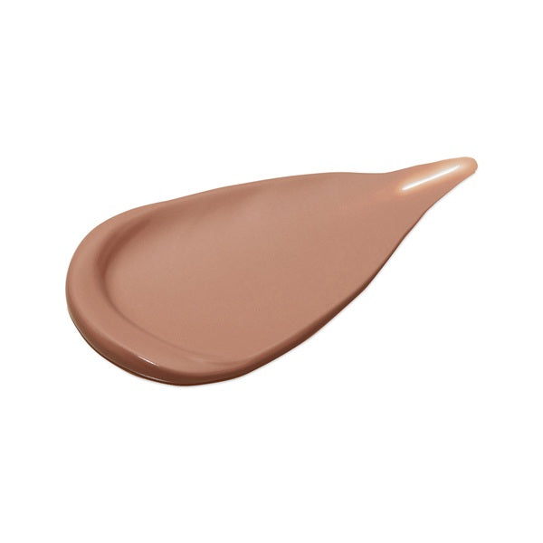 Nude-colored makeup swatch on a white background