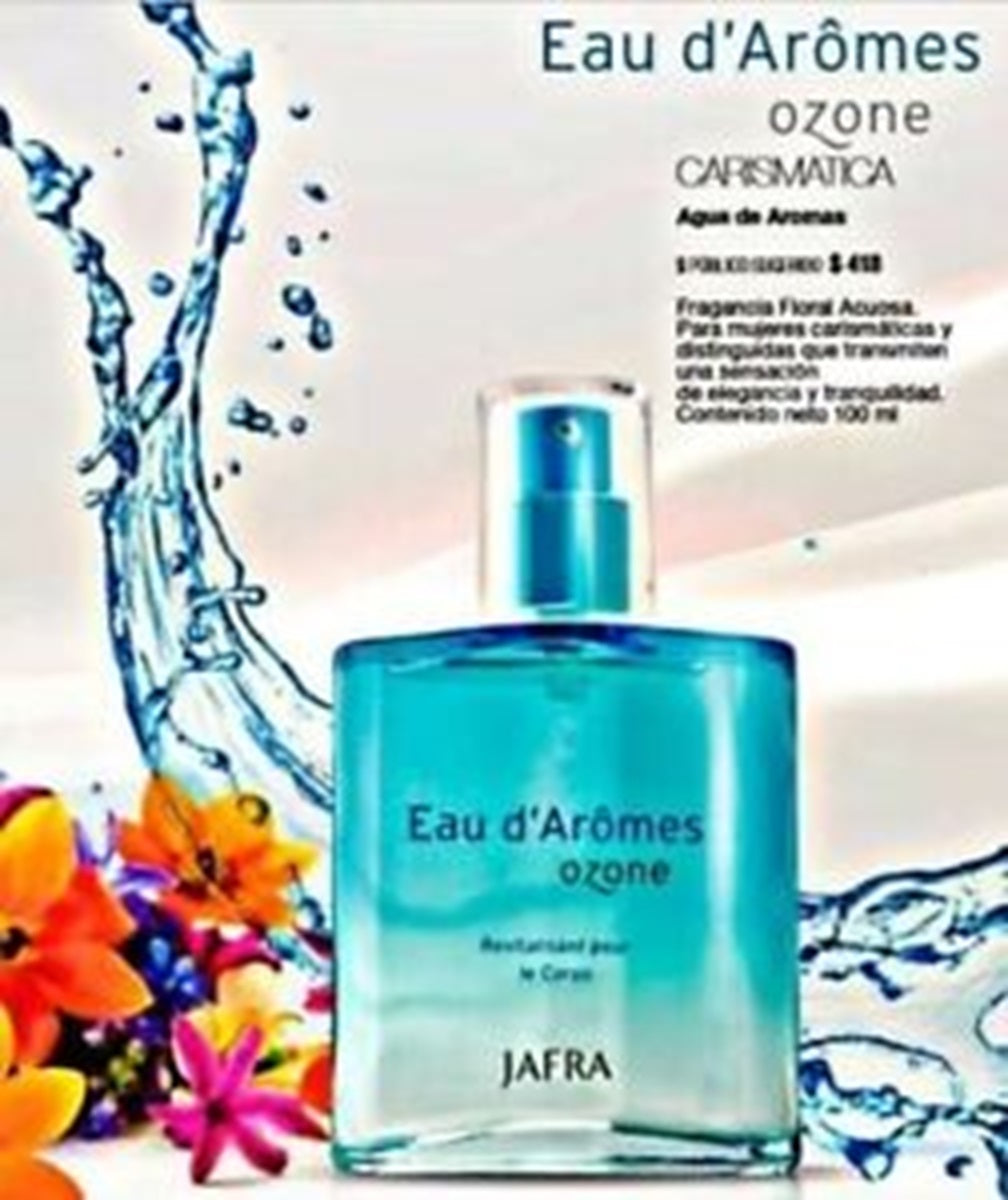 Eau d'Aromes ozone perfume bottle with water splash and flowers in the background