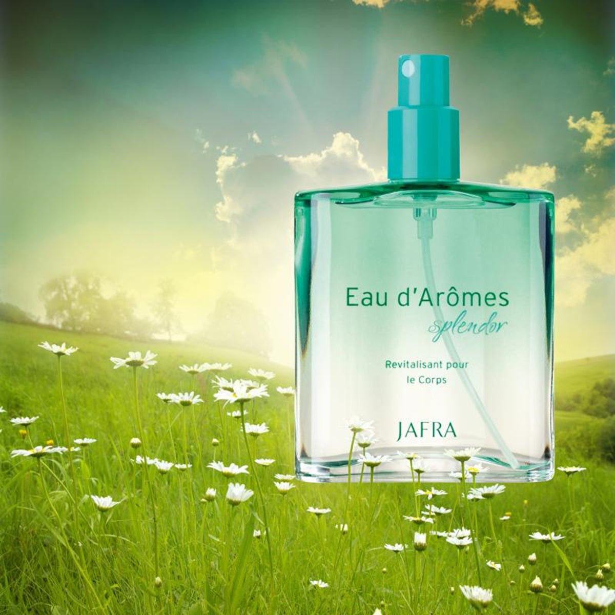 Jafra Eau d'Arômes splendor perfume bottle in a scenic outdoor setting with greenery and flowers.