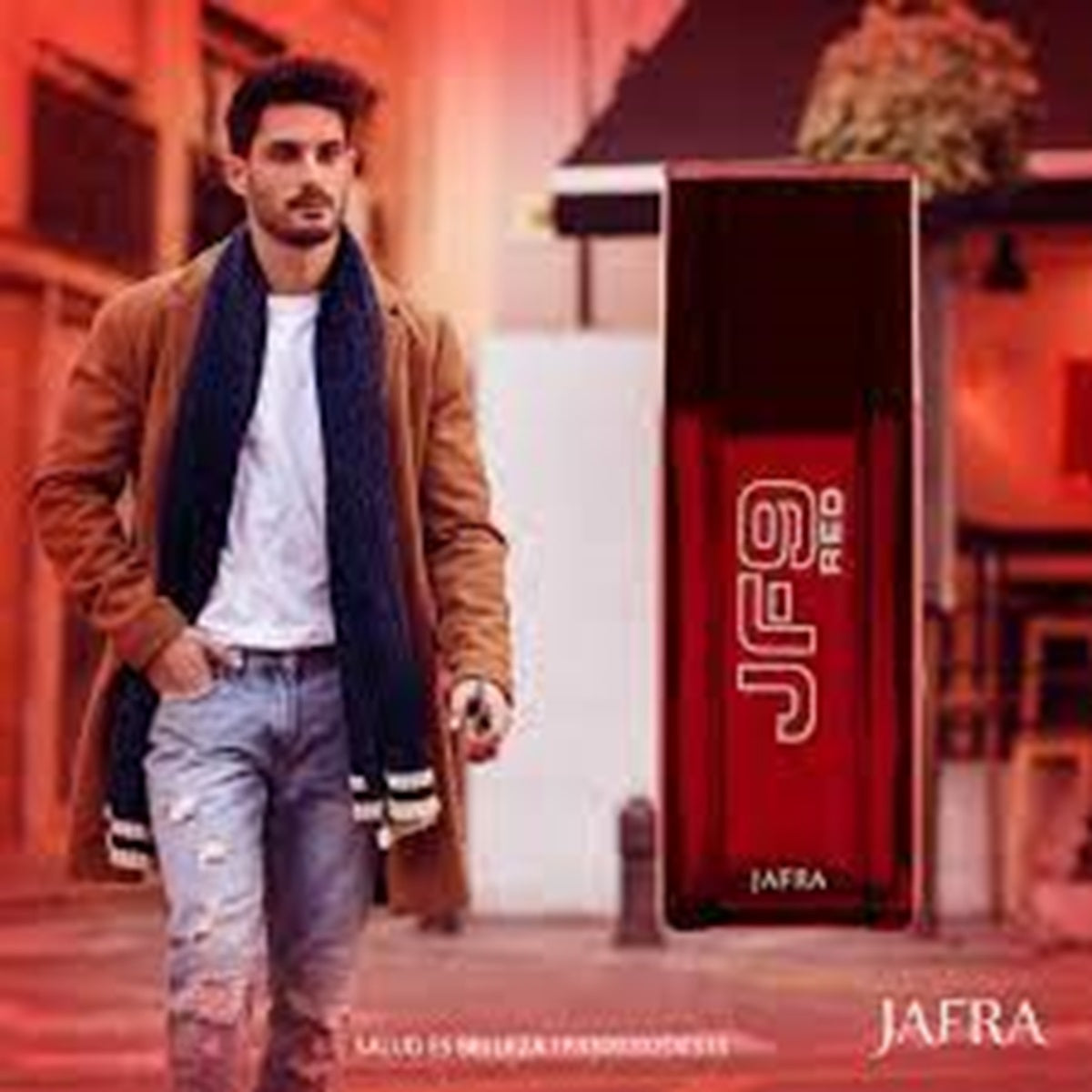 Man walking with a Jafra JF9 Red perfume bottle in the foreground