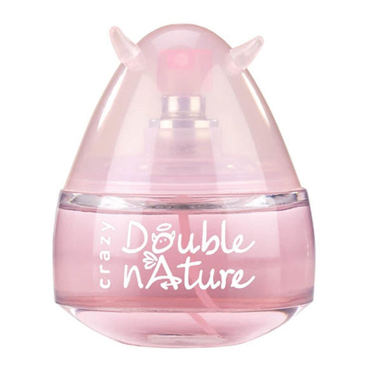 Pink perfume bottle with 'Double n'ature' text on a white background
