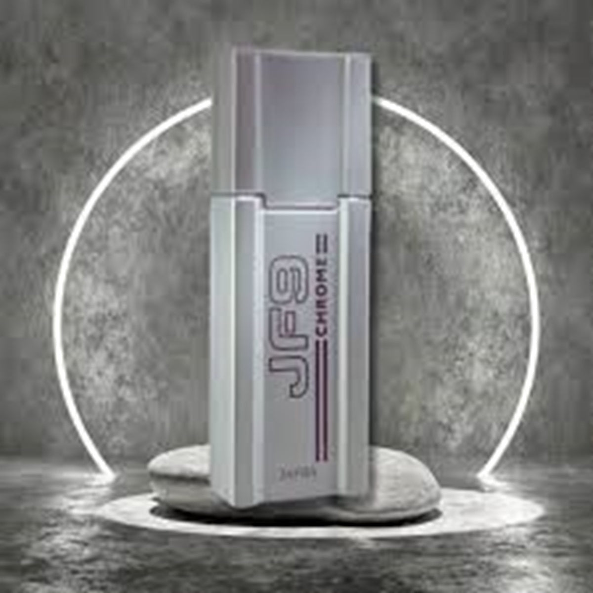 JFS Chrome II perfume bottle on a gray background