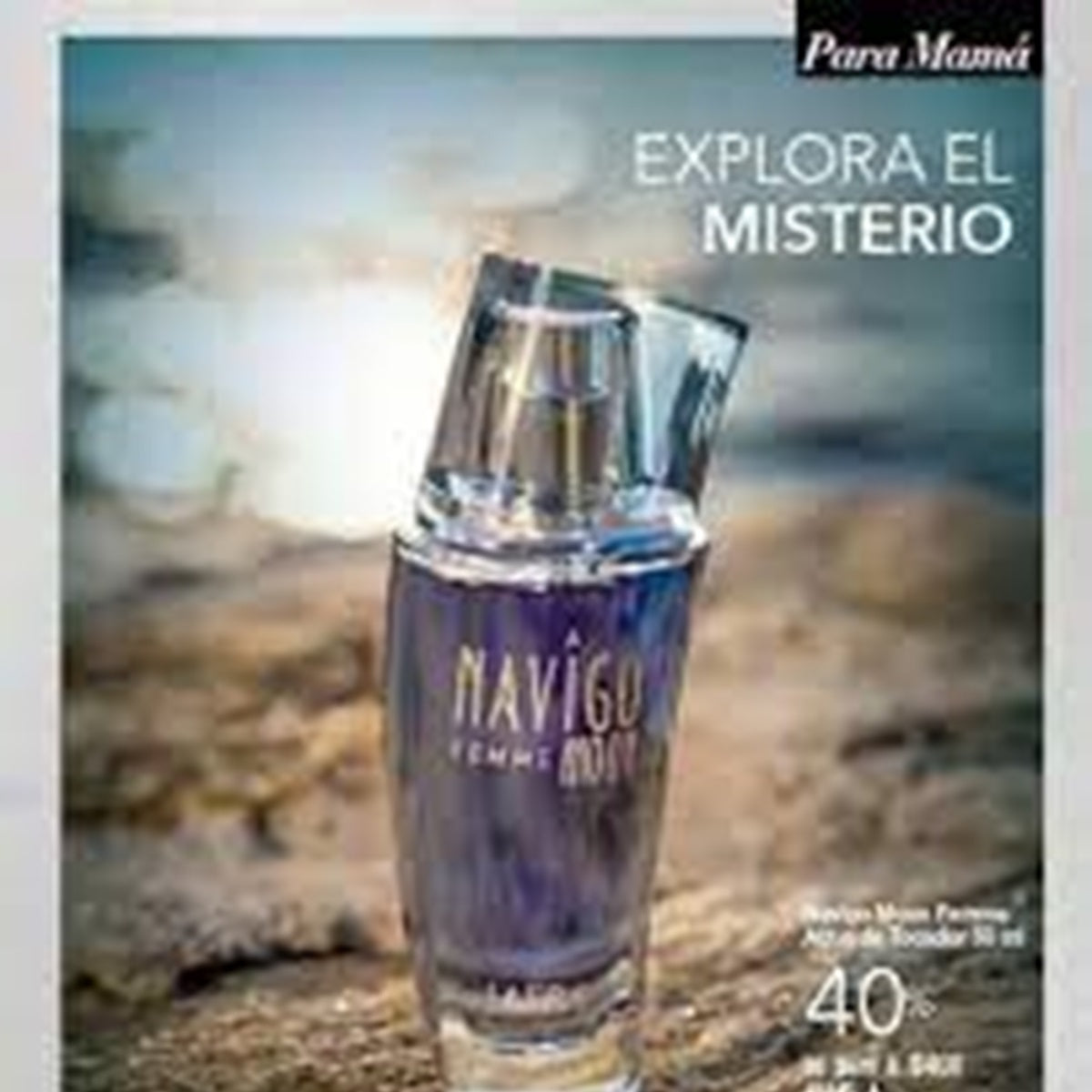 Perfume bottle labeled 'Navego' on a beach with text 'Explora el Misterio' and 'Para Mama'.