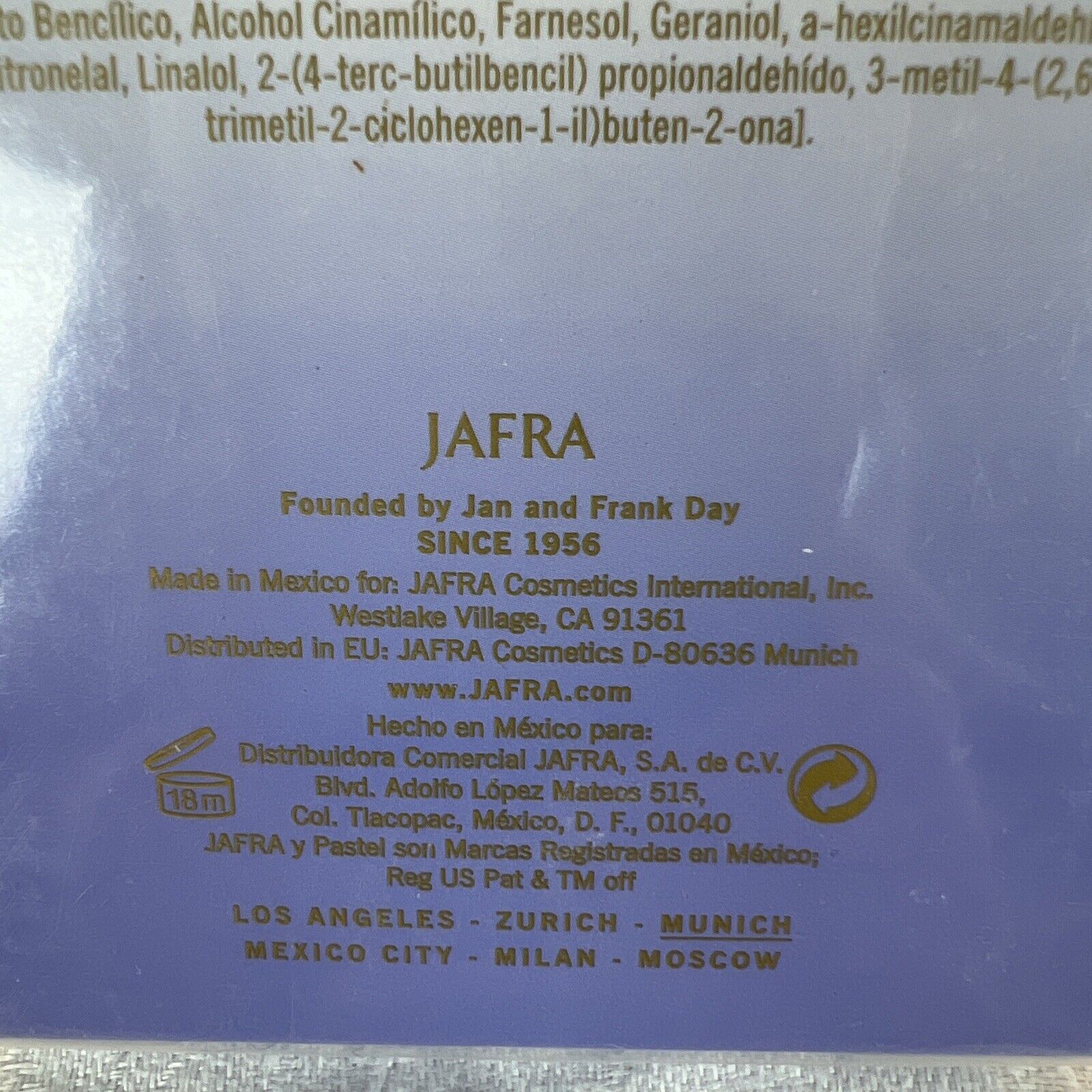 Back of a cosmetic product packaging with JAFRA branding and contact information.