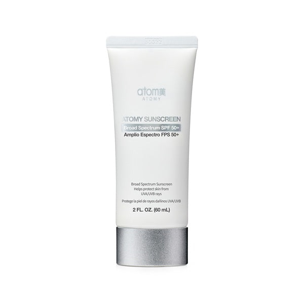 TOMY sunscreen tube on a white background