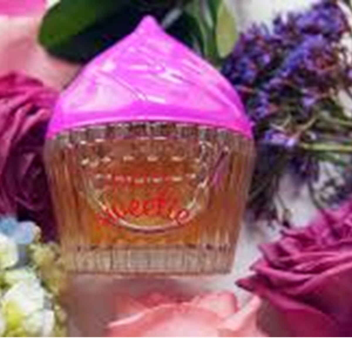 Pink and clear container with 'Sweet' branding surrounded by flowers
