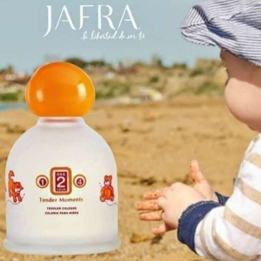 JAFRA cologne bottle with a child's hand in the foreground, outdoor setting