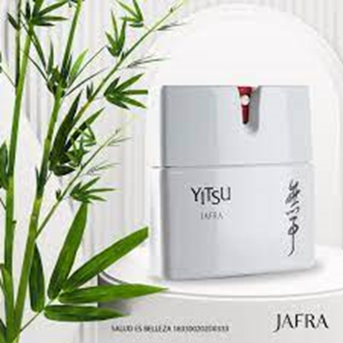 YITSU JAFRA skincare product with green leaves in the foreground